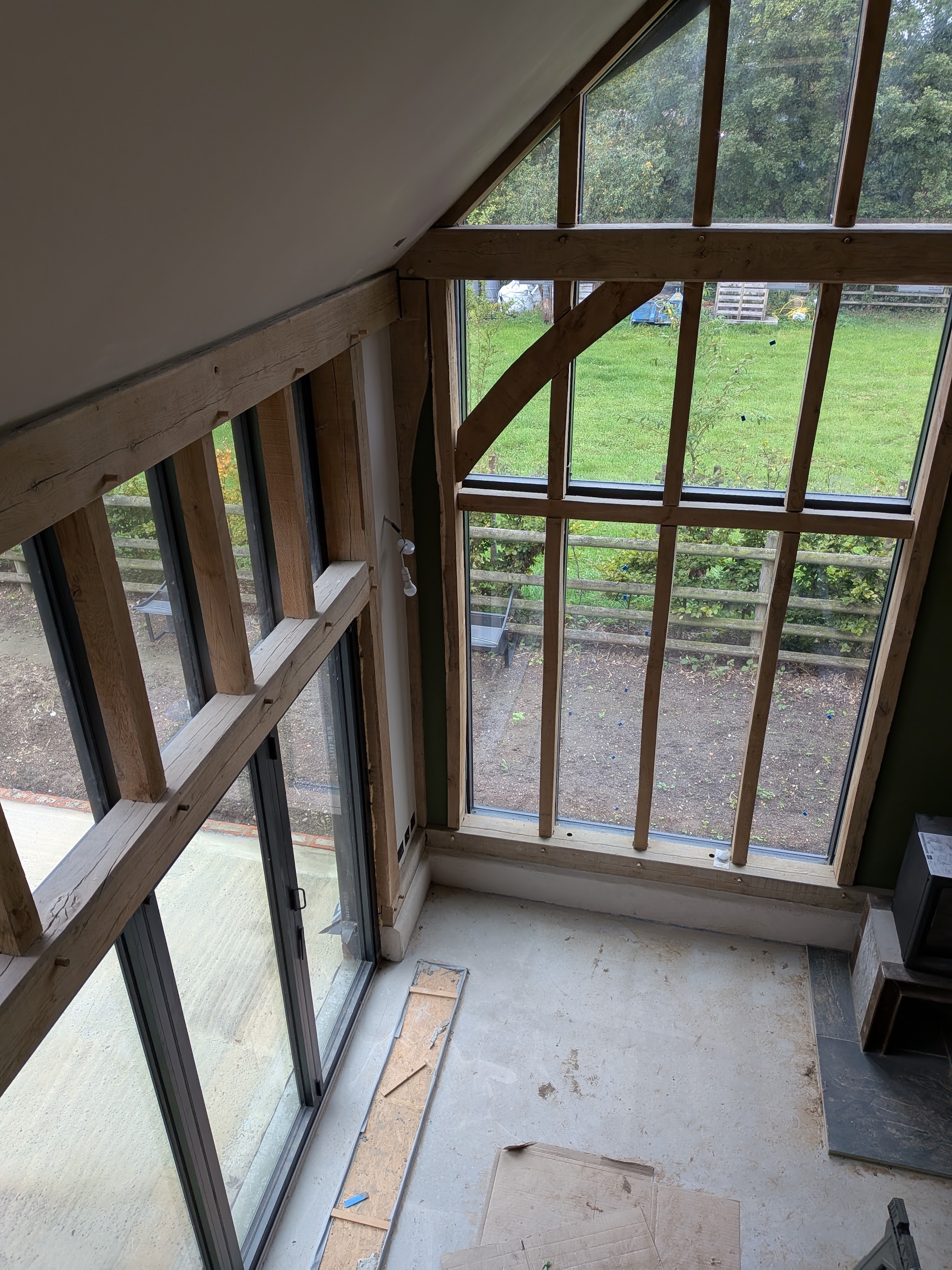 Oak-framed glazed room during a decorating job